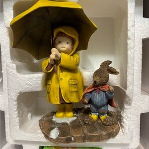 Yellow Raincoat Figurine with Umbrella and Bunny